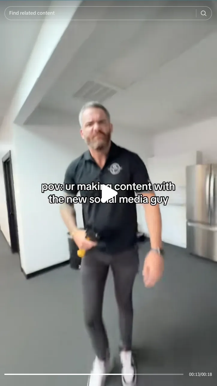 Roofing by Prodigy - Man in black polo shirt and gray pants walking indoors with text overlay reading 'pov: ur making content with the new social media guy.'