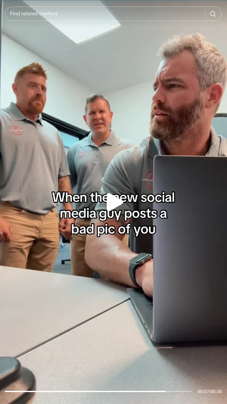 Roofing by Prodigy - Three men in gray polo shirts react to a laptop screen with the caption 'When the new social media guy posts a bad pic of you.'